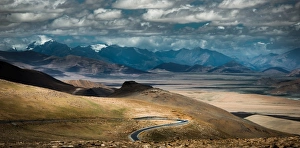 Images Dated 28th June 2012: Meandering road over Tibetan hill side