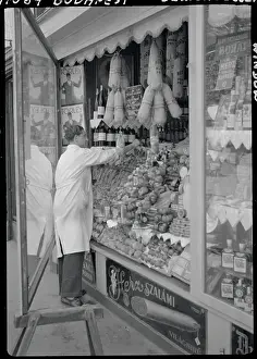 Budapest Prints: Meat Market Vendor Arranging Window Display
