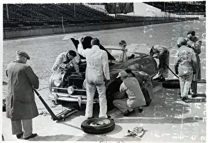 Racetrack Prints: Mechanics Work on Racecar for Auto Race