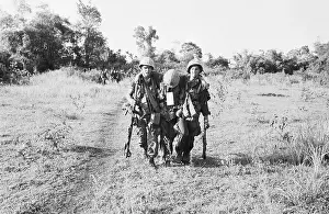 Assist Prints: Medics Assist Wounded Marine in Vietnam