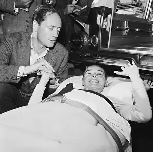 Ambulance Prints: Mel Ferrer Holding Hands with Injured Audrey Hepburn