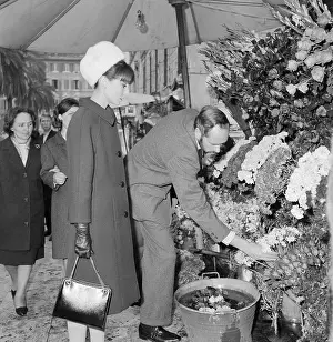 Cut Flowers Prints: Mel Ferrer Picking Out Flowers with Audrey Hepburn