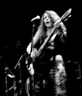 Prints of American singer-songwriter and musician Melissa Etheridge performs on stage at the Roseland Ballroom in New York City, New York, circa 1991. (Photo by Bob Berg/Getty Images) Timeless Moments: A Visual Journey Through History’s Defining Images: Melissa Etheridge Concert