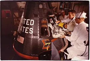 Walter M Prints: Men Assisting Walter Schirra into Space Capsule