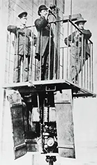 Men Atop Exhibition's Electric Elevator
