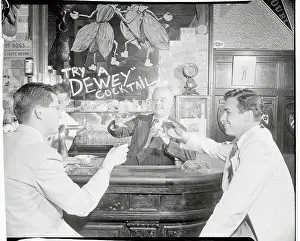 Three Men in Bar Drinking Dewey Cocktail