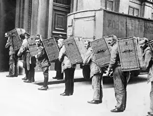 Banking Prints: Men Carrying Baskets of Money