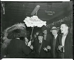Men Cheering at Woman with Parasol
