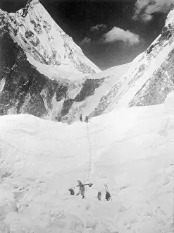 Men Climbing Mount Everest