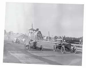 Men Competing in an Auto Race