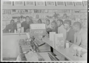 Sit In Prints: Men Demonstrating in Drug Store