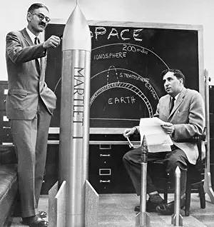 Men Discuss Prototype of Ballistic Missile