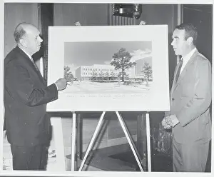 Men Discussing New Building