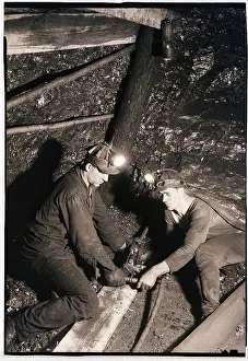 Men Drilling in a Coal Mine