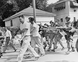 Intimidation Prints: Three Men Driven Away By Soldiers