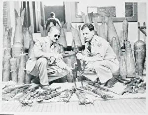 Costa Rica Prints: Men Examining Weapons