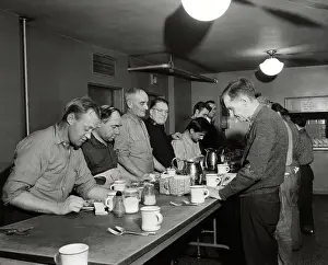 Men Being Fed A Meal at Salvation Army Site