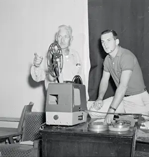 Men with Film Projector