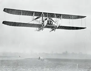Biplane Prints: Men Flying a Biplane