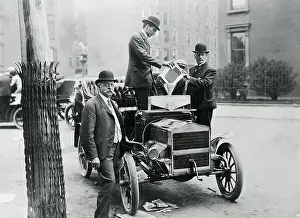 Pouring Prints: Men Fueling Car With Man In Foreground