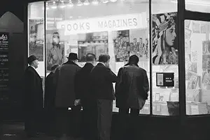 Men Gazing into Book Store Window