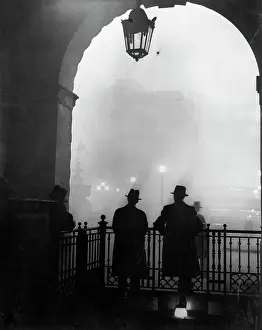 Men Gazing Over Railings
