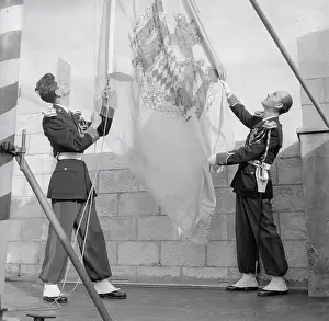 Men Hoisting the Royal Flag