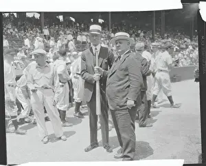 Men Holding Baseball Bat