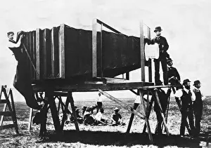 Folding Camera Prints: Men with Huge Camera