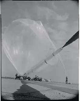 Meteorology Prints: Men Inflating a Weather Balloon