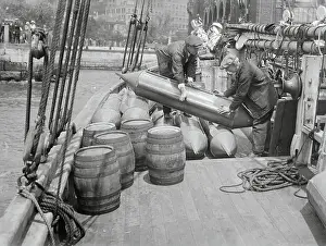 Men Inspecting Bootlegging Torpedoes