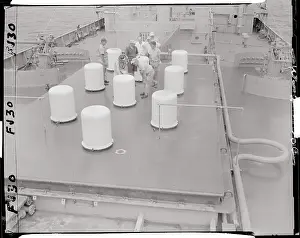 Men Inspecting Gamma Ray Measuring Devices
