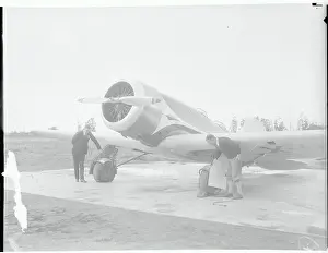 Men Inspecting New Lindbergh Plane Wing