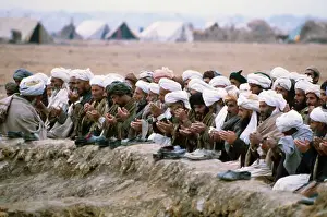 Men Kneeling on Ground in Afghanistan