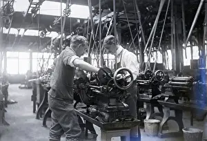 Two Men At A Lathe In Machine Shop