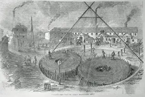 Men Laying Coil of Telegraph Cable on the Street