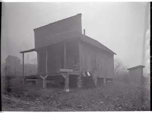Arkansas Prints: Three Men Leaning Up Against a Building