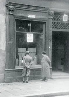 Warsaw Prints: Men Looking at a Store for Jewish Customers Only