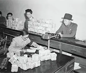 Fedora Prints: Men Making Large Bank Deposit in China
