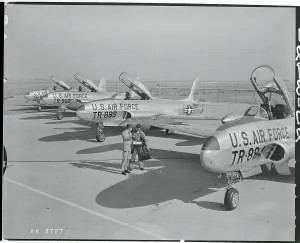 Burbank Prints: Men and Military Airplanes on Runway