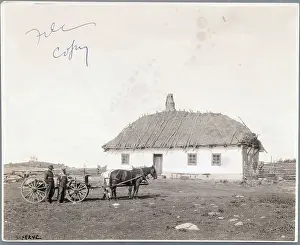 Manitoba Prints: Two Men near Horse Driven Wagon and House