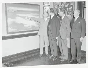 Men Observing Photograph