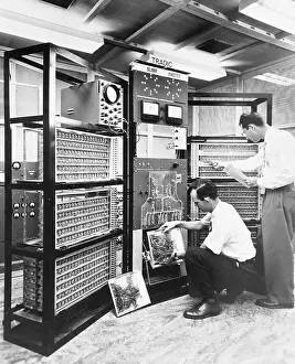 Men Operating a Computer