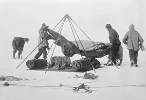 Men Pitching Tents