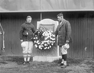 Zack Wheat Prints: Two Men Placing a Wreath on a Monument