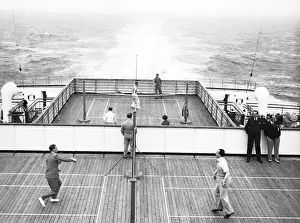 Men Playing Deck Tennis