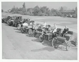 Men Posing With Vintage Cars