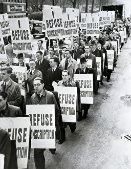 Men Protest Conscription; Carrying Sign