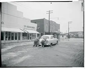 Men Pushing a Car