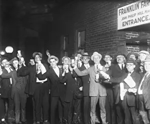 Men Raising Their Cups